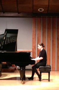 BYU senior Hannah Giullian improvs at the piano in the Laycock Duo concert. (Photo by Taylor Davies.)