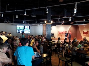A crowd enjoys performers at Karaoke Night at The Wall. 