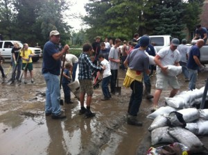 Alpine residents work to retain flooding with sandbags and shovels. Photo courtesy of Jessica Frazier
