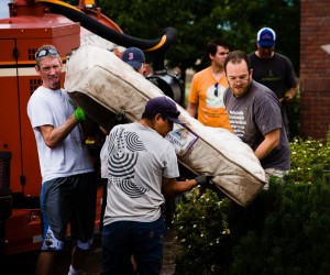 Members of the Loveland, Colorado Stake remove items from a basement destroyed by Colorado's devastating floods. Photo courtesy of Norm Rehme.