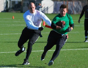 A quarterback eludes a defender during intramural competition Saturday. Air Raid game-plans several designed plays, including quarterback draws. Photo by Maddi Dayton