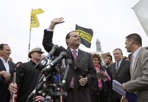 Utah Sen. Mike Lee waves to audience members at a rally protesting the closure of the World War II Memorial. Photo Courtesy Alex Brandon, Associated Press