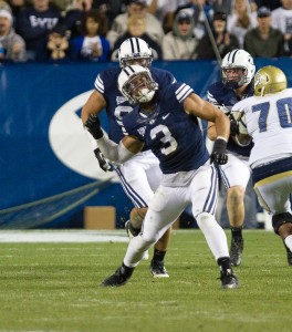 Kyle Van Noy celebrates a tackle during the game against Georgia Tech. Photo by Sarah Hill.