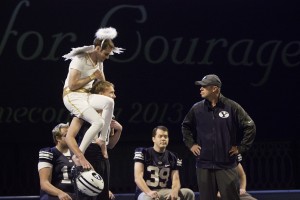 Bronco Mendenhall, joined by the crowd favorite shoulder angel, performed a skit written by Studio C at Tuesday's homecoming opening ceremonies.