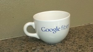 Charles Robinson, Alpine Village leasing consultant, owns a Google Fiber cup. Alpine Village will be the first Provo apartment complex to get Google Fiber before the end of October or the beginning of November. (Photo by Jordan Miera.)