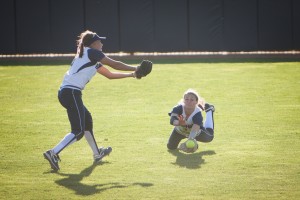 Outfielder Lacey Millett-Hofstedt makes a diving catch during BYU's weekend doubleheader. Photo by Sam Paskins