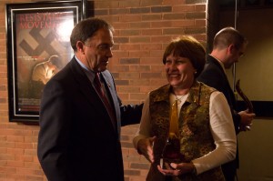 Governor Gary Herbert gives ________an award in behalf of her ______ at the screening of "Resistance Movement." Photo by Austin Lindsay