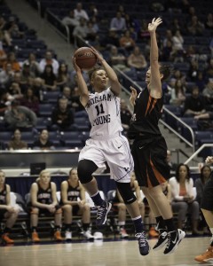 Xojian Harry looks to deliver a pass in a game against Idaho State last season. Photo by Elliott Miller.