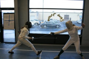 Two members of the BYU Fencing Club parry during a club meeting in Provo. Photo courtesy BYU Fencing Club.