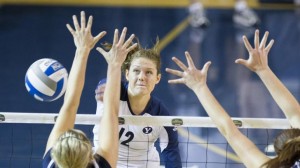 Jessica Jardine spikes the ball during a home match this season. Photo by Bella Torgerson/ BYU Photo