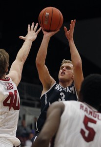 Brigham Young's Tyler Haws (3) shoots over Stanford's John Gage (40) and Chasson Randle (5) during the second half of an NCAA college basketball game, Monday, Nov. 11, 2013, in Stanford, Calif.  AP Photo/George Nikitin