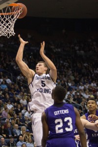 Sophomore guard Kyle Collinsworth goes up for a layup against Weber State. Photo by Ari Davis