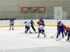 BYU faces off against Boise State in and all out battle for the puck (photo courtesy of Josh Naumu)