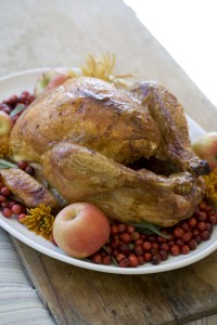 The traditional Thanksgiving meal includes a roasted turkey and various side dishes. One plateful could easily amount to nearly 2,500 calories. (AP Photo.)