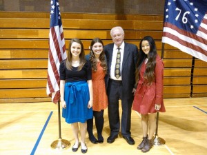 Vietnam Veteran Wayne Kuehne stands with  student government officers  Rachel Sybrowsky, Taylor Pugmire, and Solmee Yu