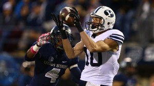 Wide receiver Mitch Matthews makes a catch during his breakout three touchdown performance against Utah State. Matthews will require surgery and is out for the season. Photo by Jaren Wilkey/ BYU Photo