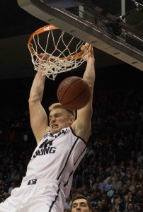 Eric Mika throws down a dunk in BYU's contest against Mount St. Mary's. Photo by Ari Davis