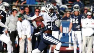 Sophomore running back Jamaal Williams takes off for a run against Nevada. Williams rushed for over 200 yards for the first time in his career against the Wolfpack. Photo courtesy Mark Philbrick/ BYU Photo