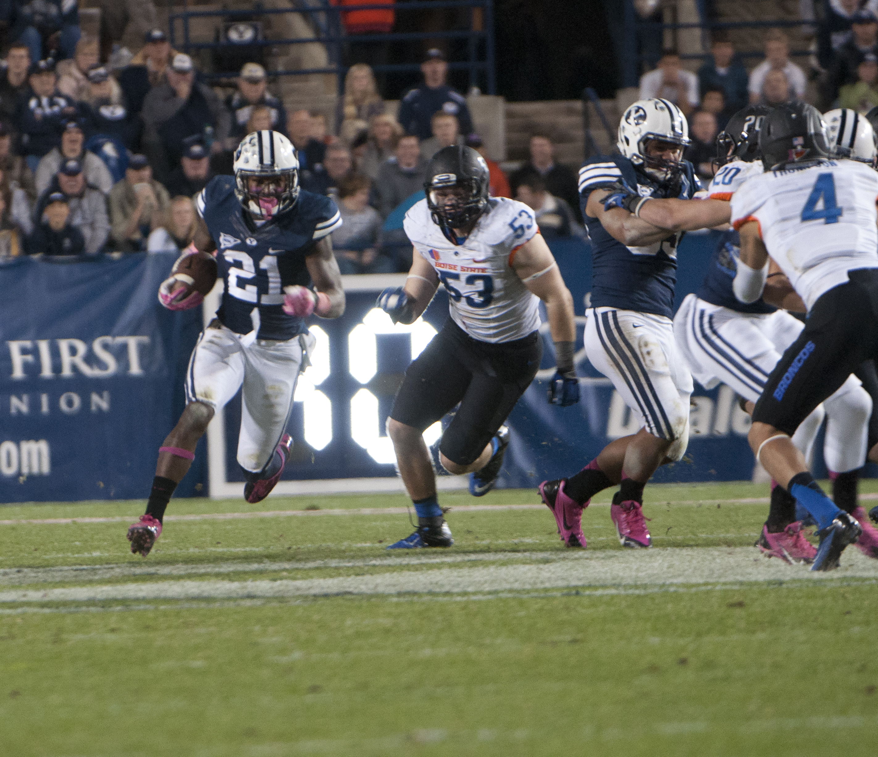 Jamaal Williams outruns his Bronco defender in the Boise State vs. BYU game. (Photo by Maddi Dayton)