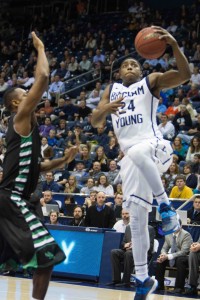 Frank Bartley drives towards the hoop  in the game against North Texas