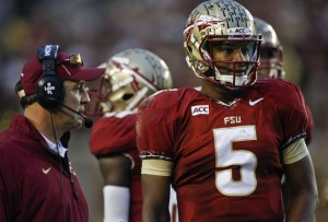 In this photo taken on Saturday, Nov. 23, 2013, Florida State quarterback Jameis Winston (5) look on from the sidelines during the first half of an NCAA college football game against Idaho in Tallahassee, Fla. AP Photo by Phil Sears