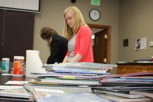 Volunteers at The United Way of Utah County sort and organize books as part of the second annual #GivingTuesday. Photo courtesy Michaelann Gardner. 