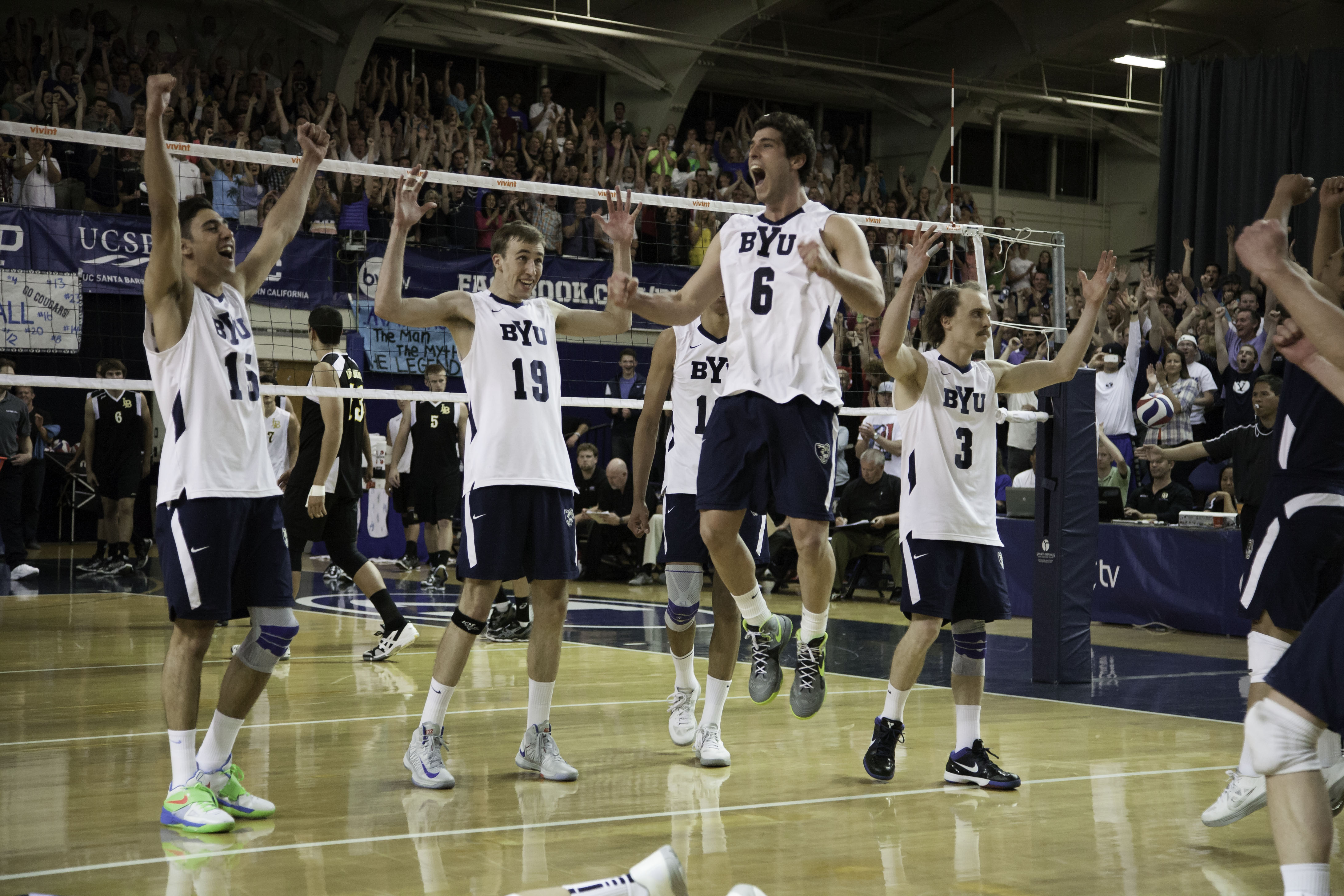 The BYU volleyball team celebrates after winning the final point to clinch the 2013 MPSF Championship title. The team progressed all the way through the NCAA Tournament, making it to the NCAA Championship game, where it fell to UC-Irvine. (Photo by Elliott Miller)