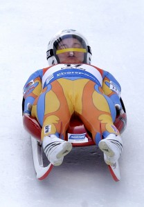 BYU student Kate Hansen races down the track during the Luge World Cup Friday, Dec. 13, 2013, in Park City, Utah. Hansen finished 4th and will represent the USA at the upcoming Olympics in Sochi, Russia. AP Photo by Rick Bowmer
