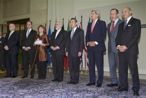 Leaders from the U.S., Iran, China, Russia, France, European Union and the U.K. gather to celebrate the negotiations on Nov. 24. (Photo by Associated Press)