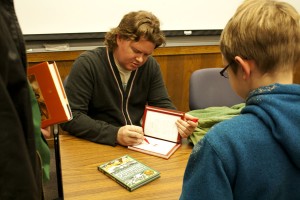 Nathan Hale signed his books after the presentation.