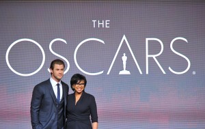Chris Hemsworth and Cheryl Boone Isaacs, President of the Academy, pose at the 86th Academy Awards nomination ceremony. (AP Photo)