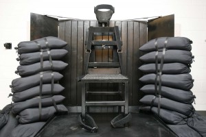 In this June 18, 2010, file photo, the firing squad execution chamber at the Utah State Prison in Draper, Utah, is show. With lethal-injection drugs in short supply and new questions looming about their effectiveness, lawmakers in some death penalty states are considering bring back relics of a more gruesome past, including firing squads. (Photo courtesy Associated Press) 