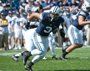 BYU linebacker Kyle Van Noy puts pressure on the Weber State offense. Photo by Chris Bunker.