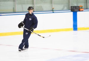 Head coach Josh Burkhart runs drills with the men's hockey team. Photo by Sarah Hill