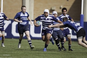 A BYU rugby player gets through the defense and heads toward the goal line during a recent game. Photo by Elliott Miller.