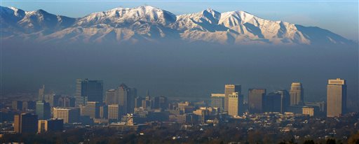 The Oquirrh Mountains as a an inversion blankets the Salt Lake Valley (AP Photo/The Salt Lake Tribune, Steve Griffin)