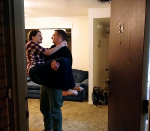 BYU students and newlyweds Joanna and Paul Rasband enter their new apartment near campus. Photo by Lucy Schouten.