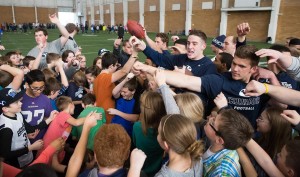 Sixth graders interact with BYU athletes at the annual Sports Hero Day. 