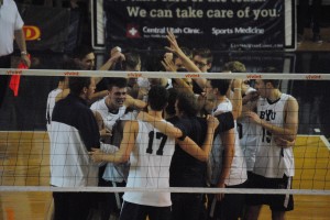 The BYU men's volleyball teams huddles together after a victory over Long Beach State. Photo by Sarah Hill