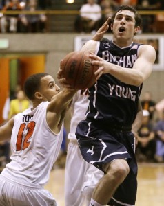 Matt Carlino lays up a shot against Pacific's Andrew Bock in the second half of the game in Stockton, Calif. Photo courtesy AP Photo/Ben Margot.