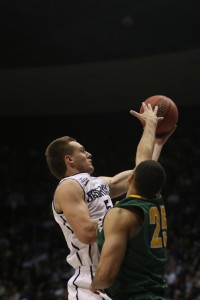 Kyle Collinsworth raises for a shot against Pacific. Photo by Natalie Stoker