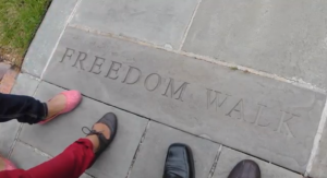BYU students on the Civil Rights Tour begin the "Freedom Walk" pathway which encircles Kelly Ingram Park. The path took them through many monuments made to stand as a reminder of the hardships and terror of the Civil Rights Movement. Photo courtesy Civil Rights Trip. 