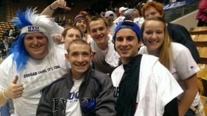 McKay Wood (center), the first ever BYU ROC Star, enjoys the St. Mary's game with the rest of the front row. 