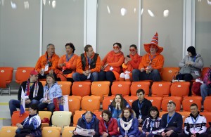 Empty seats are seen as Dutch skating fans wait for the start of the men's 5,000-meter speedskating race at the Adler Arena Skating Center at the 2014 Winter Olympics in Sochi, Russia, Saturday, Feb. 8, 2014. (AP Photo/Matt Dunham)