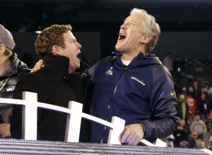 Seattle Seahawks head coach Pete Carroll celebrates with general manager John Schneider after the NFL Super Bowl XLVIII win against the Denver Broncos on Sunday. The Seahawks won 43-8. Photo courtesy AP Photo/Ted S. Warren.