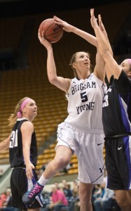 Jennifer Hamson drives to the basket against Portland during Thursday night's game in the Marriott Center. Photo by Sarah Hill.