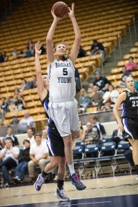 Jennifer Hamson jumps above Portland's defenders to score during a game at the Marriott Center.