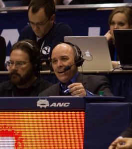 Radio announcer Greg Wrubell in his element in the Marriott Center. Wrubell has been the "Voice of the Cougars" since 1997. Photo by Ari Davis