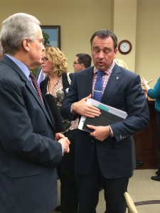 Rep. Hughes talks with supporters after the House passed his bill on preschool education funding for "at risk" children.