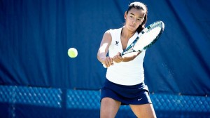 Freshman tennis player Toby Miclat returns a serve at practice. Photo courtesy BYU Photo